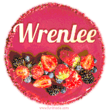 Beautifully decorated red velvet berry birthday cake with vibrant fruits and a glowing 'Wrenlee' name, adding a touch of sweetness and sparkle.