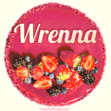 Beautifully decorated red velvet berry birthday cake with vibrant fruits and a glowing 'Wrenna' name, adding a touch of sweetness and sparkle.