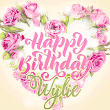 A stunning heart made of pink roses surrounds the elegant script text 'Happy Birthday Wylie' on a soft beige background. Animated sparkles add a magical and festive feel.