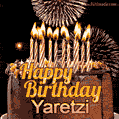 A glowing personalized birthday GIF with name Yaretzi featuring lit candles with intricate designs, warm lighting, and the text 'Happy Birthday' in an elegant font.