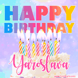 A vibrant animated name GIF with the words 'Happy Birthday Yaroslava' with colorful candles on a creamy cake. The background sparkles with pastel shades, adding a festive touch.