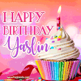 A vibrant birthday GIF featuring a rainbow-colored cupcake topped with white frosting, sprinkles, and a lit candle. The text reads 'Happy Birthday Yaslin' in bold pink and violet letters with white outline.