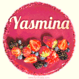 Beautifully decorated red velvet berry birthday cake with vibrant fruits and a glowing 'Yasmina' name, adding a touch of sweetness and sparkle.