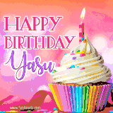 A vibrant birthday GIF featuring a rainbow-colored cupcake topped with white frosting, sprinkles, and a lit candle. The text reads 'Happy Birthday Yasu' in bold pink and violet letters with white outline.