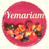 Beautifully decorated red velvet berry birthday cake with vibrant fruits and a glowing 'Yemariam' name, adding a touch of sweetness and sparkle.