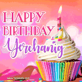 A vibrant birthday GIF featuring a rainbow-colored cupcake topped with white frosting, sprinkles, and a lit candle. The text reads 'Happy Birthday Yerchanig' in bold pink and violet letters with white outline.