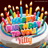 A colorful birthday cake topped with lit candles, with the words 'Happy Birthday Yitty' in bold glowing letters on a burgundy background. Animated flames add a festive touch.