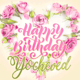 A stunning heart made of pink roses surrounds the elegant script text 'Happy Birthday Yocheved' on a soft beige background. Animated sparkles add a magical and festive feel.