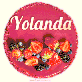 Beautifully decorated red velvet berry birthday cake with vibrant fruits and a glowing 'Yolanda' name, adding a touch of sweetness and sparkle.
