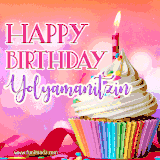 A vibrant birthday GIF featuring a rainbow-colored cupcake topped with white frosting, sprinkles, and a lit candle. The text reads 'Happy Birthday Yolyamanitzin' in bold pink and violet letters with white outline.