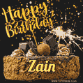 Celebrate Zain's birthday with a GIF featuring chocolate cake, a lit sparkler, and golden stars