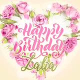 A stunning heart made of pink roses surrounds the elegant script text 'Happy Birthday Zalia' on a soft beige background. Animated sparkles add a magical and festive feel.