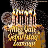 A chocolate birthday cake with glowing candles, the German text 'Alles Gute zum Geburtstag Zamaya,' and vibrant fireworks lighting up the background in an animated GIF.