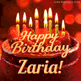 Beautifully decorated red velvet berry birthday cake with vibrant fruits and a glowing 'Zaria' name, adding a touch of sweetness and sparkle.
