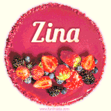 Beautifully decorated red velvet berry birthday cake with vibrant fruits and a glowing 'Zina' name, adding a touch of sweetness and sparkle.