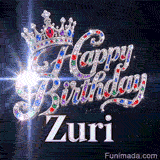 Metallic white nameplate spelling Zuri under a majestic queen crown decorated with shiny party crystals.