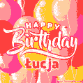 A vibrant name GIF featuring colorful balloons in shades of pink, orange, and yellow with the bold text 'Happy Birthday Łucja' in festive fonts, creating a lively birthday vibe.