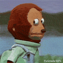 'Monkey Puppet' meme character looks straight ahead with wide eyes, then glances nervously to the side. The puppet has brown fur and wears a light blue shirt.