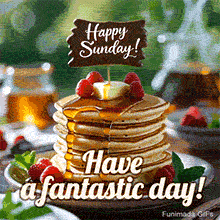 Mouth-watering stack of fluffy pancakes topped with melting butter, dripping syrup, and fresh raspberries. A wooden sign says Happy Sunday above the message Have a fantastic day.